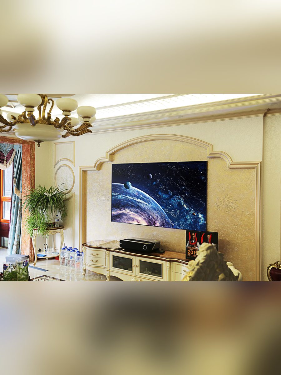 Living room laser cinema with ultra short throw projector