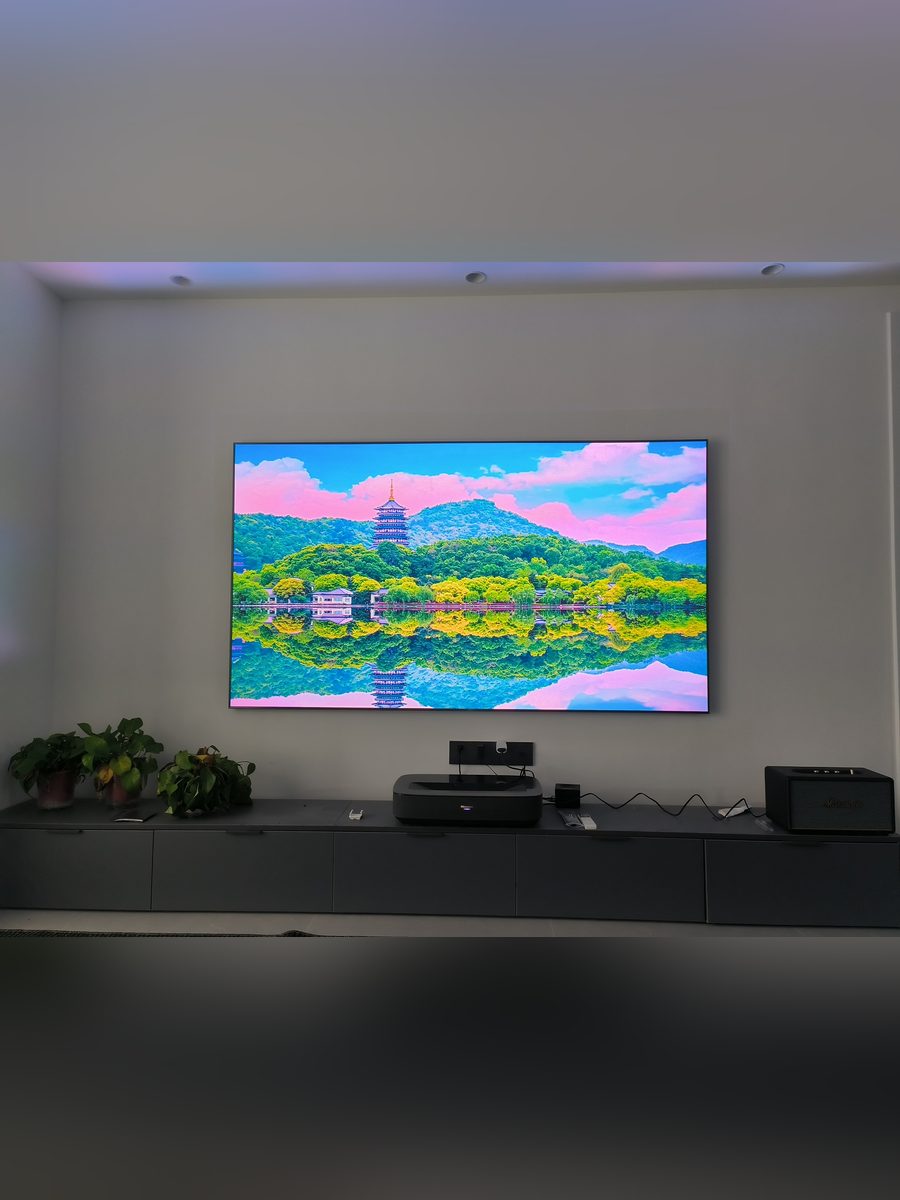 Bright living room with a 100-inch plus laser display